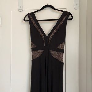 Black maxi BCBGMaxazria dress with lace details, and double front slits.